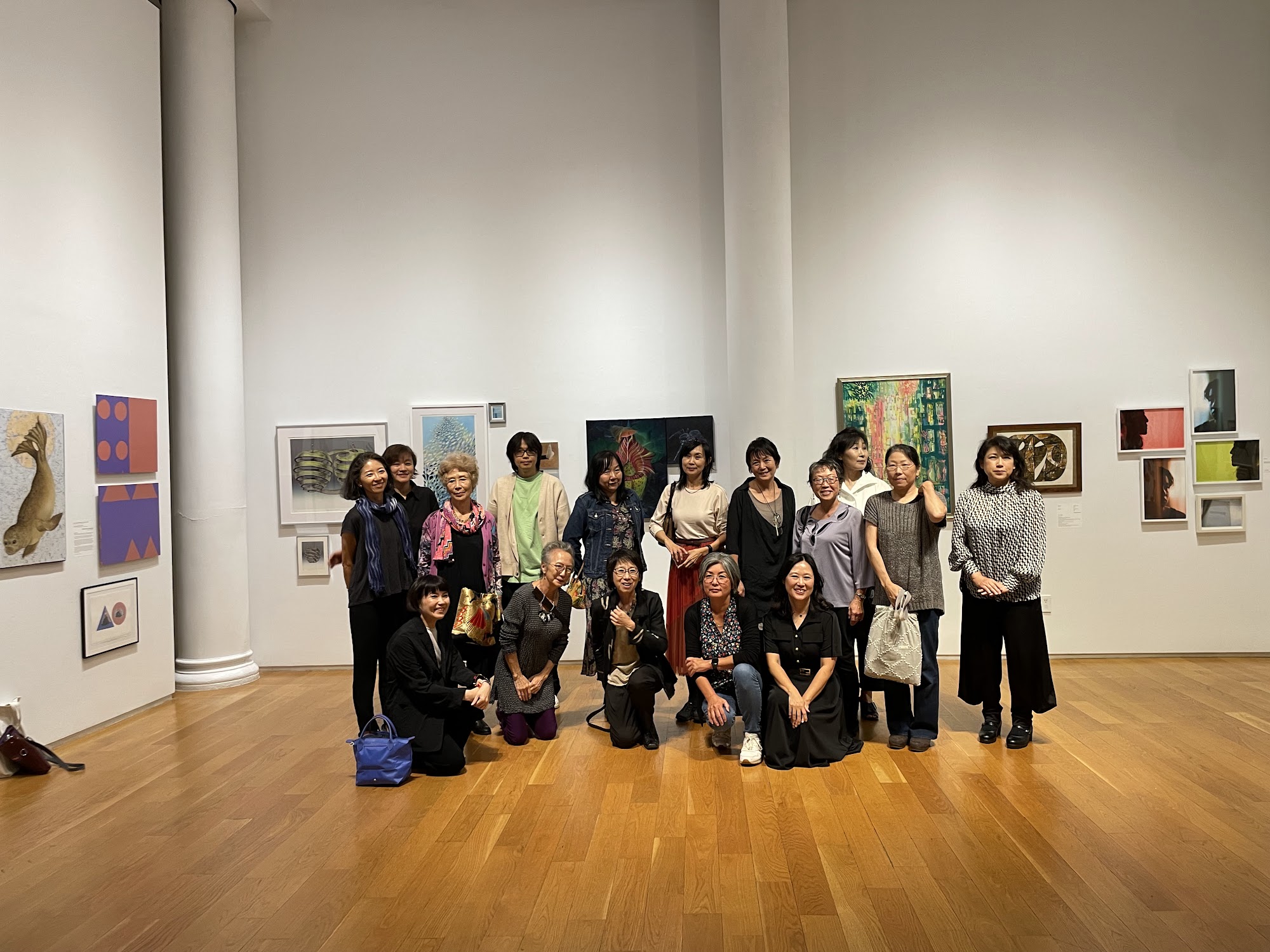 Tamabi NY Club group photo at exhibition